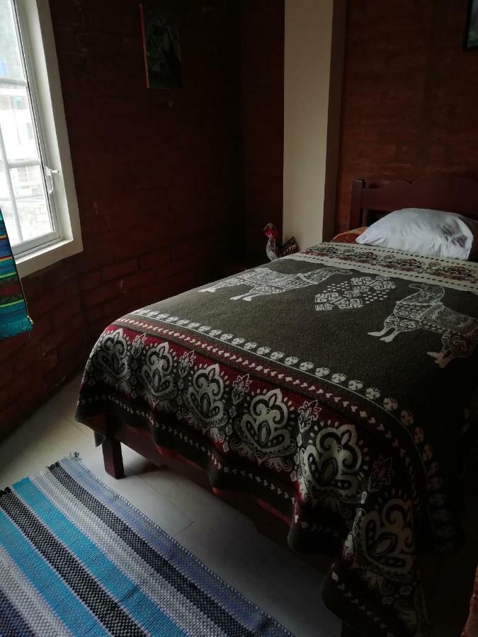 Hostal La Casa Amarilla City Banos  Exterior photo